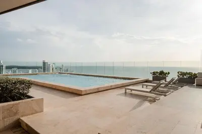 a swimming pool on the roof of a building at Ocean view apartment in Cartagena de Indias