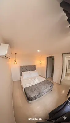 a bedroom with a large bed in a room at Fenix, Apartamento En Coveñas, Primer piso, 103 in Coveñas