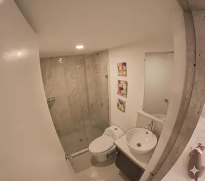 a bathroom with a shower and a toilet and a sink at Fenix, Apartamento En Coveñas, Primer piso, 103 in Coveñas