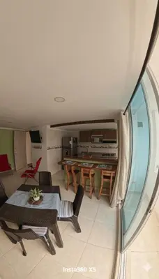 a living room with a table and chairs at Apartamento, Arena Dorada, Coveñas in Coveñas