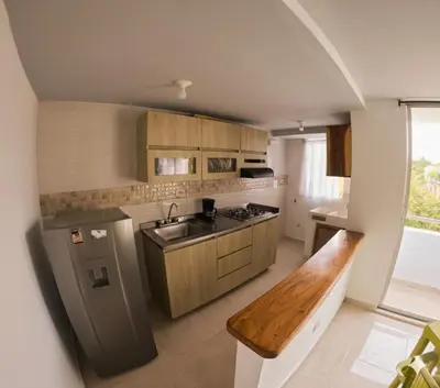 a kitchen with a sink and a counter top at Apartamento, Arena Dorada, Coveñas in Coveñas