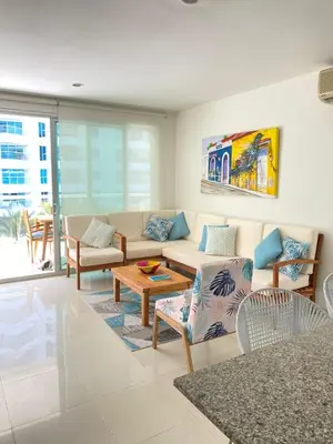 a living room with a couch and a table at NOK Oceanside getaway in Cartagena in Cartagena de Indias