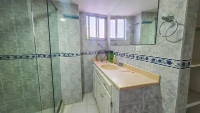 a bathroom with a sink and a shower at Apt 3 rooms Laguito Cartagena 1 block from the beach in Cartagena de Indias