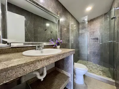 a bathroom with a sink and a shower and a toilet at Apto 894 in Cartagena de Indias