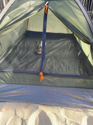 a close up of a tent with the door open at Amora Beach Camping in Baru
