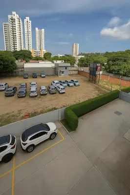 a group of cars parked in a parking lot at Cartagena Apartamento completo vista al mar in Cartagena de Indias