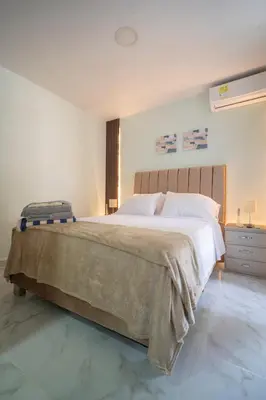 a bedroom with a large bed in a room at Aqualina 209 y 512 in Cartagena de Indias