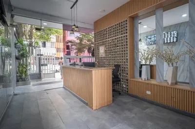 a lobby of a restaurant with a counter and windows at Aqualina 209 y 512 in Cartagena de Indias