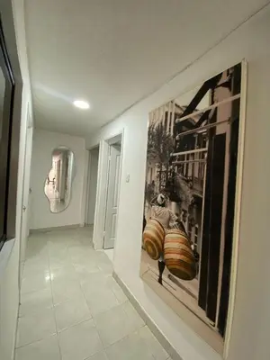 a hallway with a large picture on the wall at White House in Cartagena de Indias