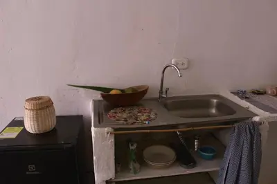 a kitchen with a sink and a bowl on a counter at Casa Grulla in Santa Marta