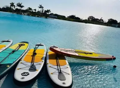 a group of kayaks are lined up in the water at Cartagena getaway - Laguna Cristalina - 2BR - 7 pax in Cartagena de Indias