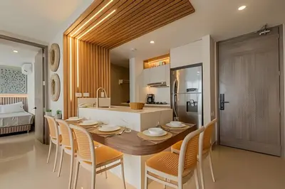 a kitchen and dining room with a table and chairs at 