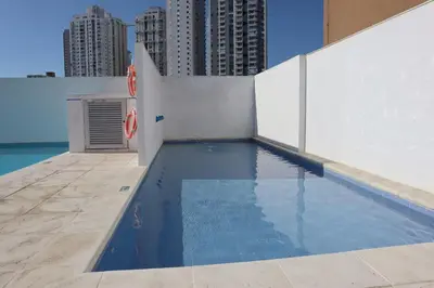 a swimming pool on the roof of a building at Cartagena Piscina, playa y cerca centro Historico in Cartagena de Indias