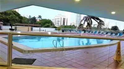 a swimming pool on the roof of a building at Cómodo APTO En El Laguito las 3 Carabelas in Cartagena de Indias