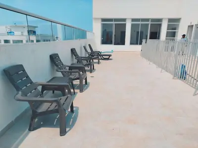 a row of chairs sitting on the roof of a building at Exclusivo Torices con Vista al Mar in Arizona