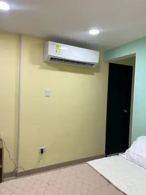 a room with a air conditioner on a wall at Ebratt Inn in Cartagena de Indias