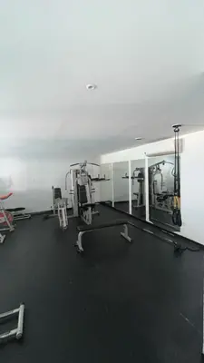 a large room with a gym with equipment in it at Apartamento en Cartagena Marbella in Cartagena de Indias