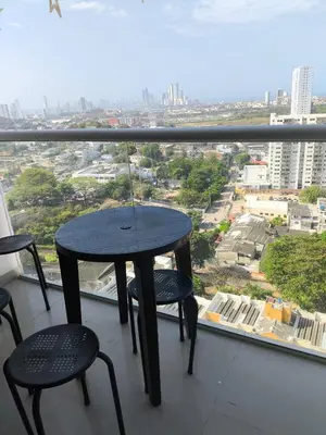 a table and two chairs in front of a window at 406 Sea Breeze and Luxury in Cartagena in Cartagena de Indias