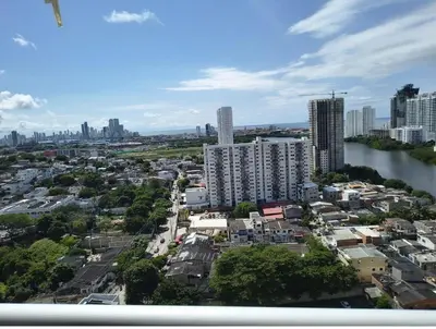 an aerial view of a city with a river and buildings at Piso 2206 Mirador de Cartagena in Cartagena de Indias