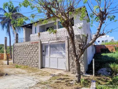 a brick house with a garage at Apartamentos en Sabanilla, Colombia -Tu Escapada Ideal! in Maizal