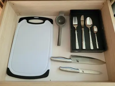 a drawer with utensils in a wooden box at Apto en EL Cabrero, Edificio Manzanillo del Mar in Cartagena de Indias