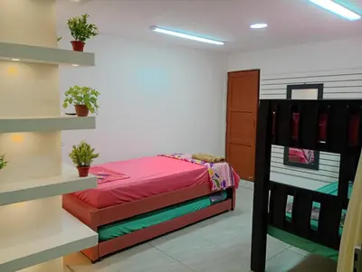 a bedroom with a bed in a room at La Escalera de Getsemani in Cartagena de Indias