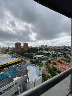 a view of a city with a building and a stadium at Blue Gardens in Barranquilla