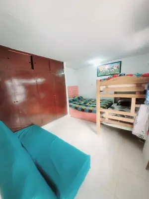 a small room with a bed and a bunk bed at Julius cartagena in Cartagena de Indias