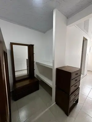 a dressing room with a mirror and a dresser at Orilla beach house in Playa Punta Arena