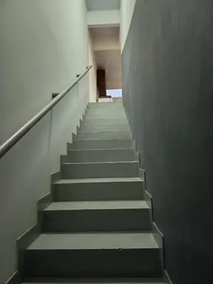 a staircase in a building with a stair case at Hotel Cartagena antigua in Cartagena de Indias