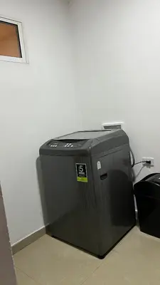a black cpu sitting on the floor in a room at GUILLO Comfort Loft 2 in Cartagena de Indias