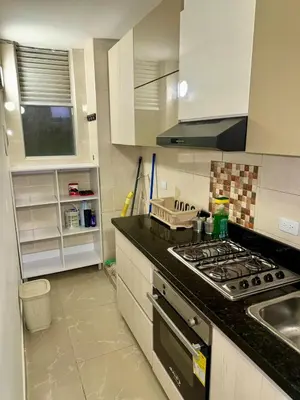 a kitchen with a stove and a counter top at Apartamento moderno in Cartagena de Indias