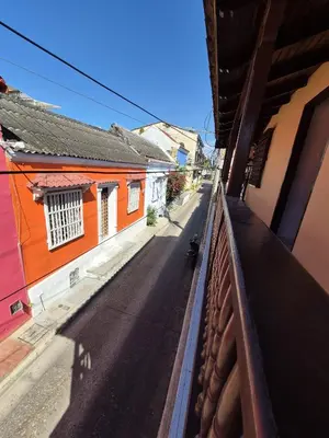 a view from a balcony of a street with buildings at Hermoso apartamento loft en la ciudad amurallada de cartagena 1 in Cartagena de Indias