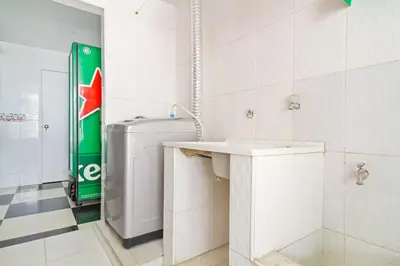 a white bathroom with a sink and a toilet at Beautiful House 3 minutes from Historic Downtown in Cartagena de Indias