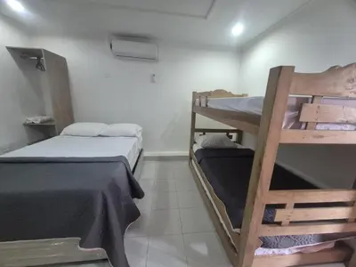 a room with two bunk beds in a room at Hermoso apartamento loft en la ciudad amurallada de cartagena 2 in Cartagena de Indias