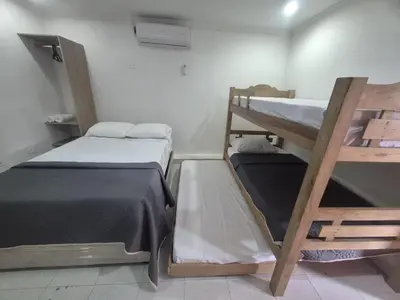 a room with two bunk beds in a room at Hermoso apartamento loft en la ciudad amurallada de cartagena 2 in Cartagena de Indias