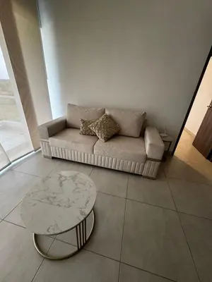 a living room with a couch and a coffee table at Sensacional Apartamento Serena del Mar in Serena del Mar