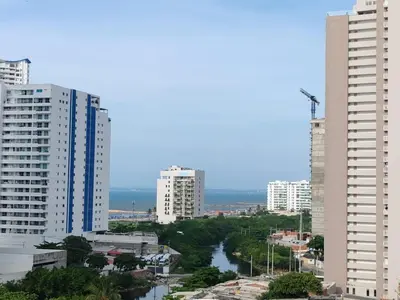 a view of a city with tall buildings and a river at Brand new apartment near the beach and historic center in Cartagena de Indias