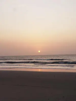 a sunset on a beach with the ocean at APARTAMENTO MORROS EOS y ECO VISTA AL MAR in Cartagena de Indias