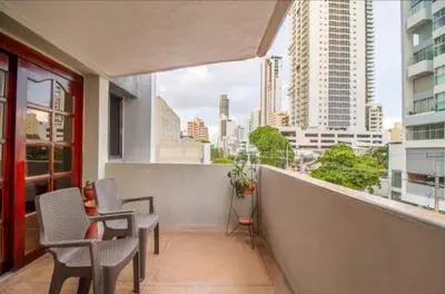 a balcony with chairs and a view of a city at Guest bedrooms economy in Bocagrande Beach Cartagena in Cartagena de Indias