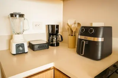 a kitchen counter with a blender and a blender at Nuevo Penthouse en Baia Kristal con gran terraza in Cartagena de Indias