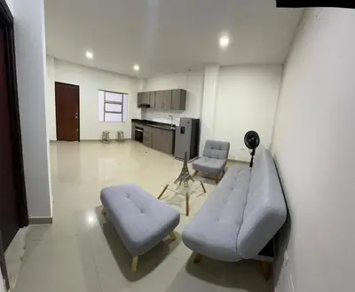 a living room with a couch and two chairs at Modern apartment in Boston, Sincelejo in Sincelejo