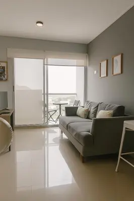 a living room with a couch and a table at Oasis Costero Apartment in Cartagena de Indias