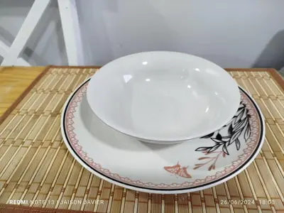 a bowl and a plate on a table at Ciudad Amurallada in Cartagena de Indias