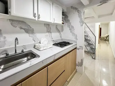 a kitchen with a sink and a stove top oven at Apartamento en Torices, sector turistico in Cartagena de Indias
