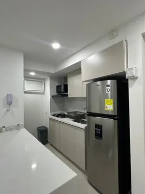 a kitchen with a stainless steel refrigerator in it at Very close to the beach and the historic center in Cartagena de Indias