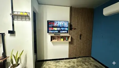 a room with a flat screen tv on a wall at Cabaña Coveñas Tolú in Coveñas