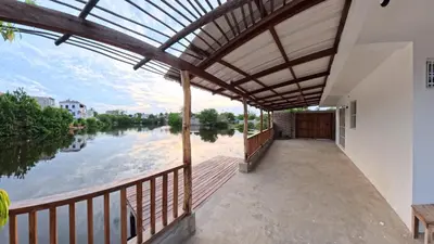 a balcony with a view of a river at Casa en el lago in Cartagena de Indias