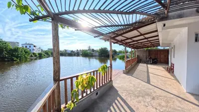 a view from the deck of a house overlooking a river at Casa en el lago in Cartagena de Indias