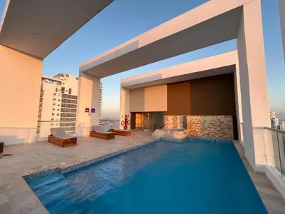 a swimming pool on the roof of a building at Dúplex en Bocagrande Cartagena Piscina, jacuzzi y a 2 cuadras del mar in Cartagena de Indias